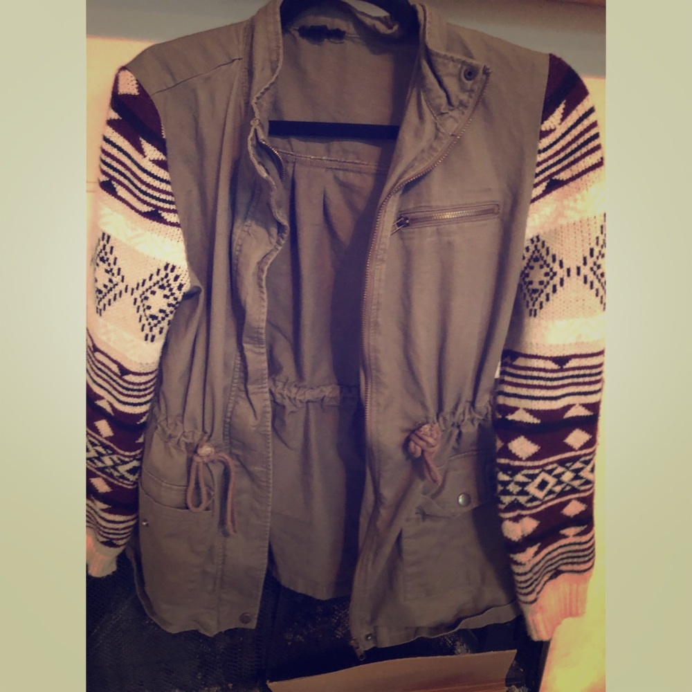 E&M green, cream, and maroon jacket